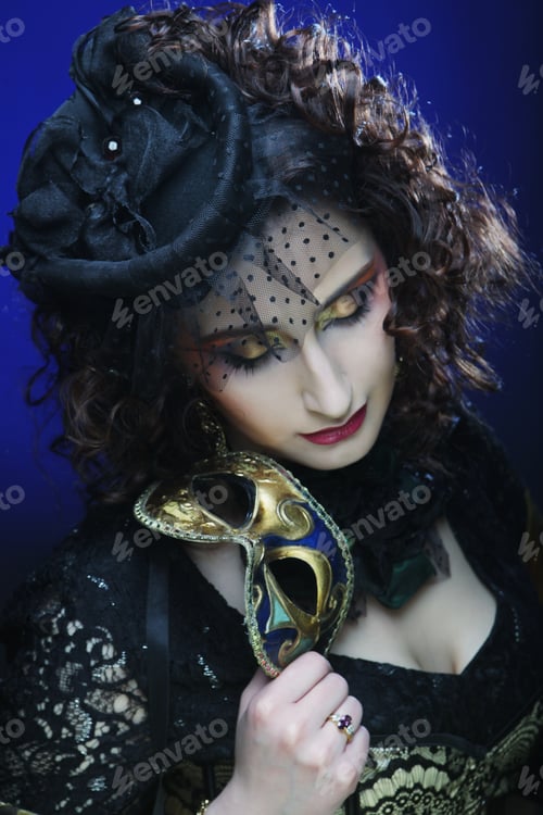 Preview: Beautiful Curly Woman With Mask. Carnaval Visage.