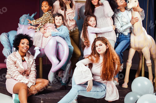 Preview: Lifestyle And People Concept: Young Pretty Diversity Nations Woman With Different Age Children