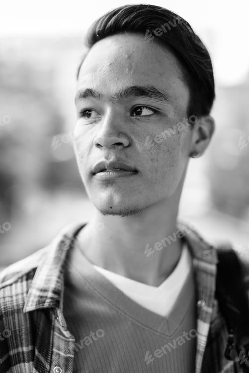 Preview: Young Handsome Indian Man Exploring The City In Black And White.