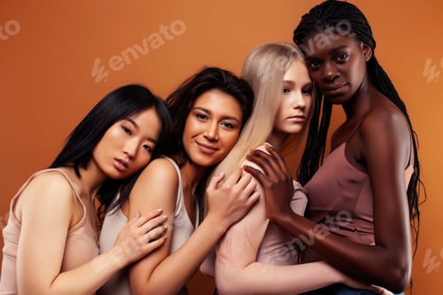 Preview: Young Pretty Asian, Caucasian, Afro Woman Posing Cheerful Together On Brown Background, Lifestyle