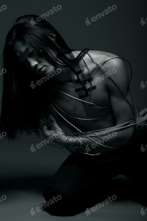 Preview: Man With Steel Wire Close Up