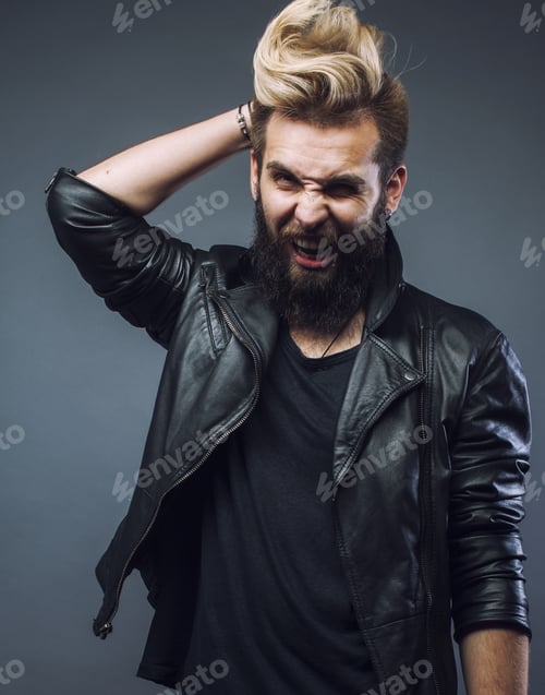 Preview: Young Attractive Bearded Hipster Man Gesturing Emotional Screaming In Studio Sucsess