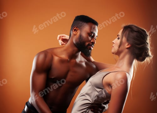 Preview: Young Pretty Couple Diverse Races Together Posing Sensitive On Brown Background, Lifestyle People