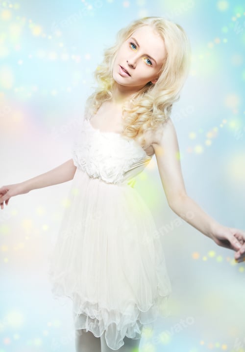 Preview: Beauty - Attractive Gentle Blonde Girl In White Dress Over Blue Blurred Background