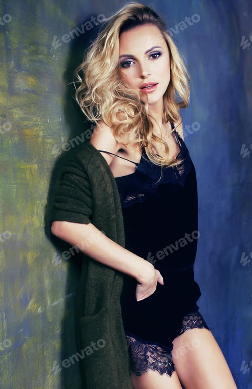Preview: Photo Of Sexy Blonde Young Girl Looking At Camera, Smiling.