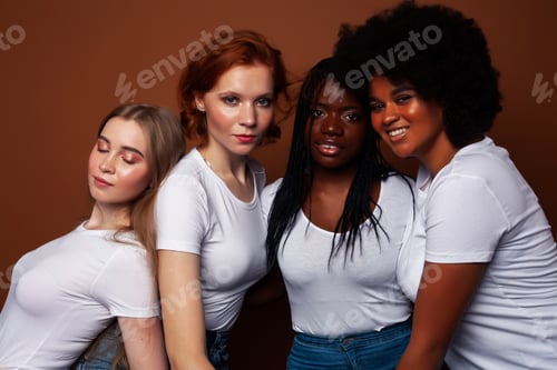 Preview: Young Pretty Caucasian, Afro, Scandinavian Woman Posing Cheerful Together On Brown Background