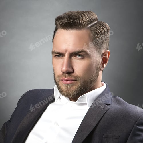 Preview: Young Handsome Bearded Caucasian Man Sitting On Chair With Cognac And A Cigar. Perfect Skin And