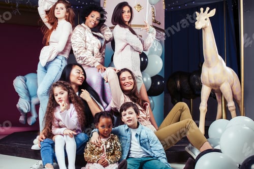 Preview: Lifestyle And People Concept: Young Pretty Diversity Nations Woman With Different Age Children