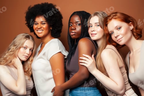 Preview: Young Pretty African And Caucasian Women Posing Cheerful Together On Brown Background, Lifestyle