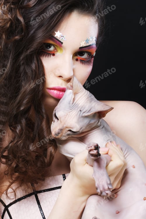 Preview: Young Princess With Sphynx Cat. Creative Fantasy Make-Up.