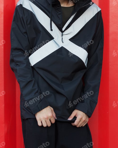 Preview: Men'S Youth Street Fashion. A Man Is Posing In A Black Jacket Of New Technological Materials On The