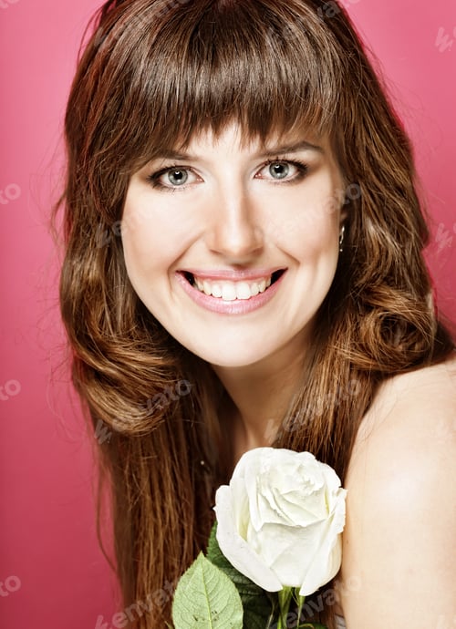 Preview: Portrait Of Beautiful Young Woman With Rose