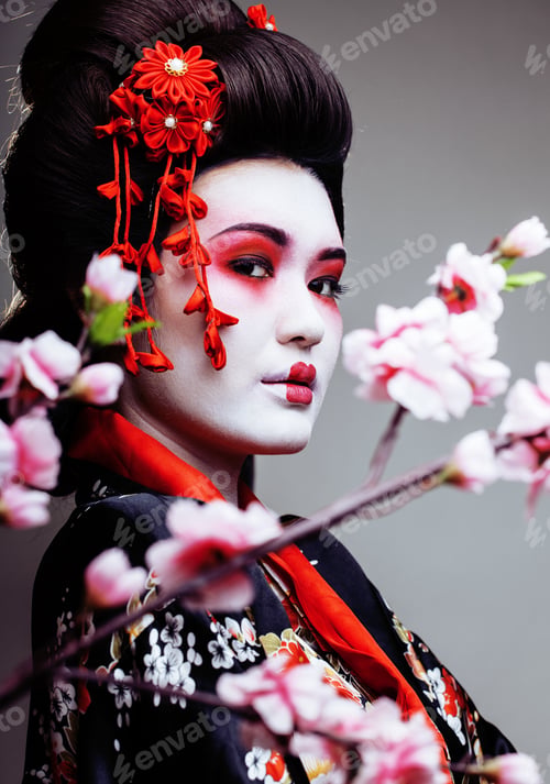 Preview: Young Pretty Geisha In Kimono With Sakura And Decoration