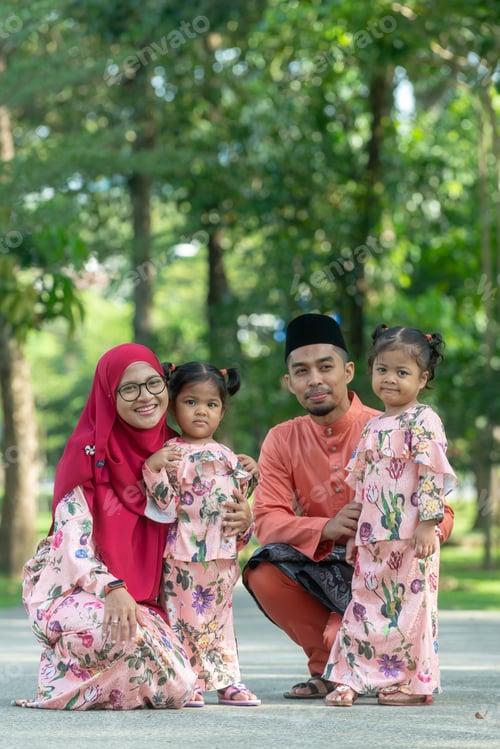 Preview: Happy Malaysia Muslim Family In Their Eid Dress. Outdoor Portrait.