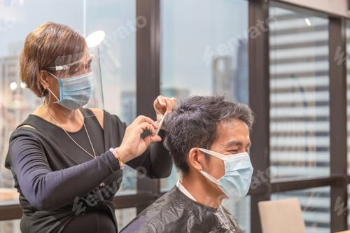 Preview: Young Man Getting Haircut By Hairdresser, Barber Using Scissors And Comb, Hairdresser And Client