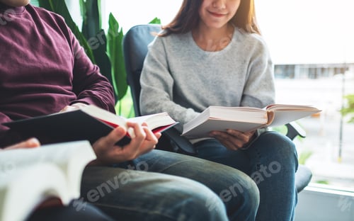 Preview: Group Of Young People Sitting And Enjoyed Reading Books Together