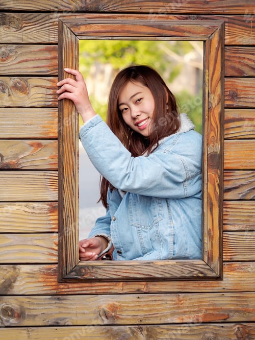 Preview: Outdoor Portrait Of Young Beautiful Fashionable Playful Chinese Lady Posing On Street With Wood