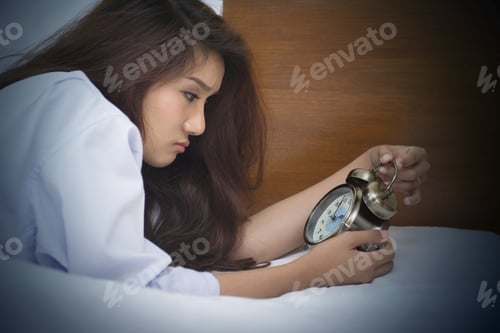 Preview: Beautiful Woman Lying On Bed Sleepless At Night. Anxiety, Stress, Disease, A Common Cause Of