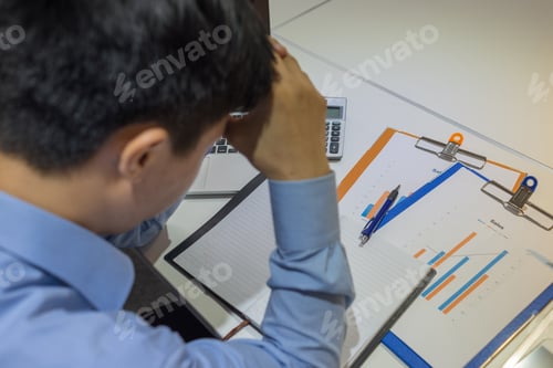Preview: Businessman Thinking About The Sales Report