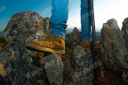 Preview: The Feet Of A Traveler Resting On A Plateau. Pov View. Sitting On Top Of A High Hill. Independent