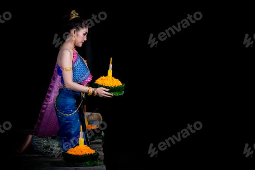 Preview: Portrait Of Beautiful Asian Woman In Thai Dress Traditional Praying Hold Kratong For Join Loy