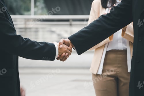 Preview: Success And Happiness Team Concept, Businessman Handshake Finishing Up A Meeting