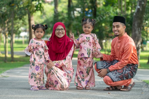 Preview: Happy Muslim Family Outdoor Portrait - Malaysia Traditional Eid Attire.