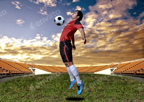 Preview: Soccer Player In Action On Sunset Stadium Background