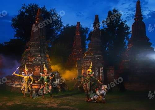 Preview: Khon Exquisite Masked Dance Drama At Night With Old Pagoda Background.Khon Is The Culture Of
