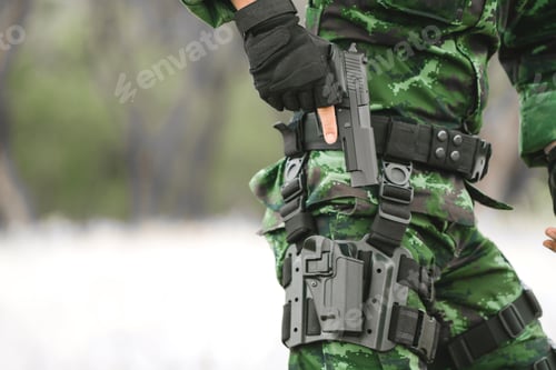 Preview: Close-Up Soldier Standing Outdoors. The Military Is Responsible For Maintaining The Territory
