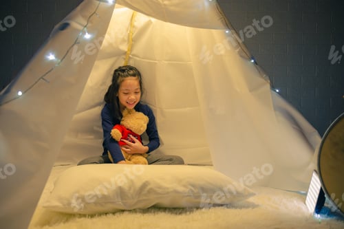 Preview: Little Girl Reading A Book In Tent, Happy Kid Playing At Home, Funny Lovely Kid Having Fun In