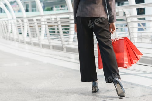 Preview: Fashion Woman Walking With Shopping Bag At Street Outdoor.