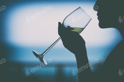 Preview: Silhouette Image Of A Woman Holding A Wine Glass To Drink With Blurred Sea Background