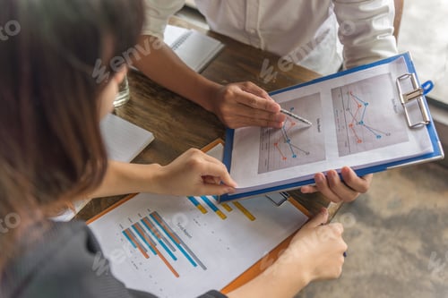 Preview: Man Hands Holding Chart Document And Pointing It