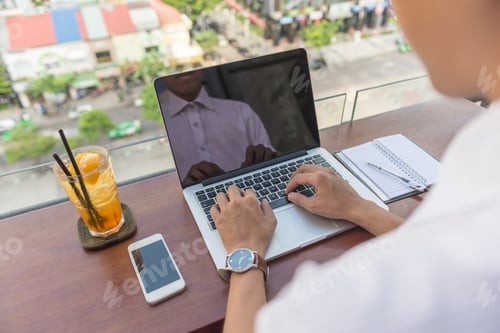 Preview: Young Man Hands Working On Laptop Outdoor