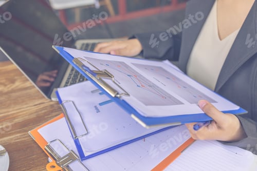 Preview: Close Up Photo Of Businesswoman Reading Sale Reports