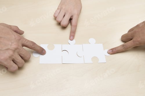 Preview: Pictures Of Guests Per Puzzles On Wood Table.