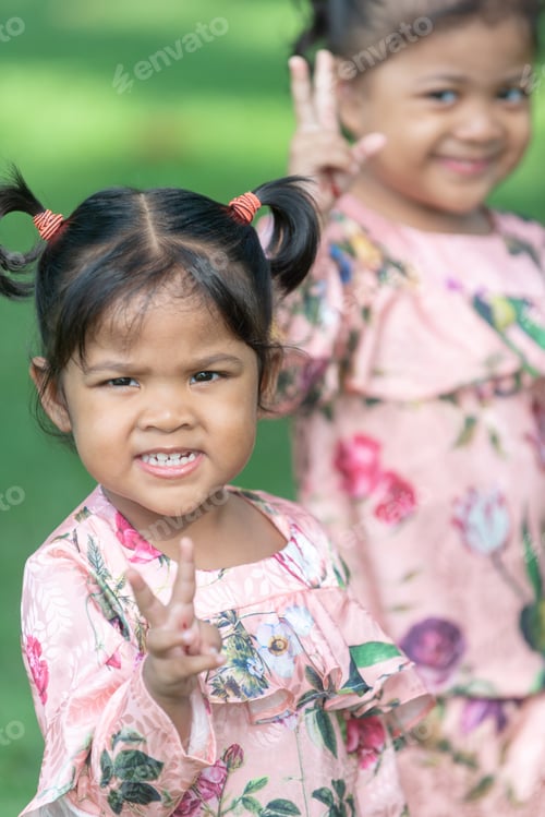 Preview: Cute Malaysian Siblings In Eid Costume. Outdoor Portrait.