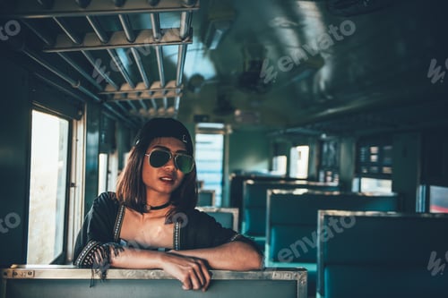 Preview: Hipster Girl Feeling Sad On The Train In The Evening Japanese Tone,Vintage Style,Dark