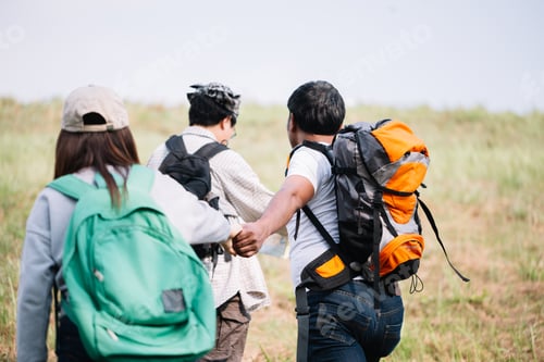 Preview: Group Of Backpacking Hikers Going To Mountain Top. Backpackers Or Hikers Travel Concept. Selective