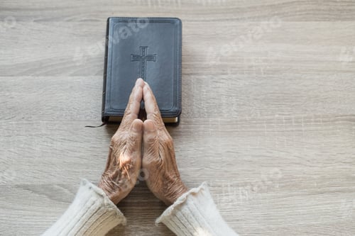 Preview: Elderly Hands Touch The Bible, Christians Are Prayer To God With Hope.
