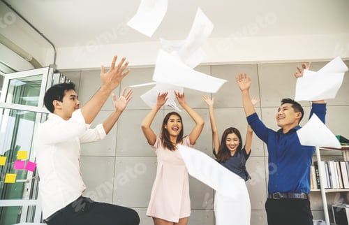Preview: Group Of Young Confident Business People Happy Smile Celebrating By Throwing Their Business Papers