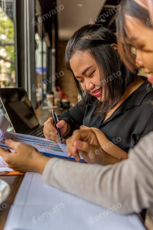 Preview: Woman Discuss About Chart Document With Her Partner
