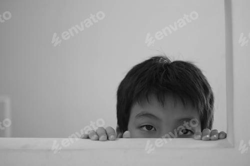 Preview: Portrait Of Little Child Hiding Behind Aperture, Copy Space