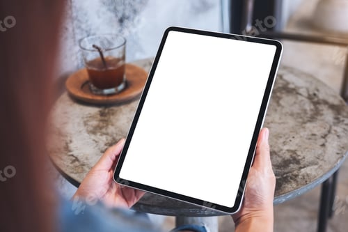 Preview: Mockup Image Of A Woman Holding Digital Tablet With Blank White Desktop Screen
