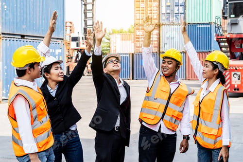 Preview: Group Of Employees And Management Team Wearing Logistic Uniforms For Exporting Products Abroad