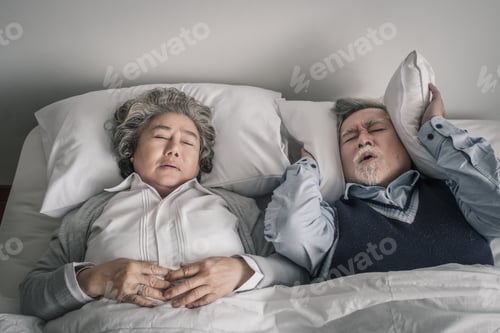 Preview: Elderly Couple Caucasian Senior Man And Woman Sleep On Bed And Snoring In White Blanket In Bedroom