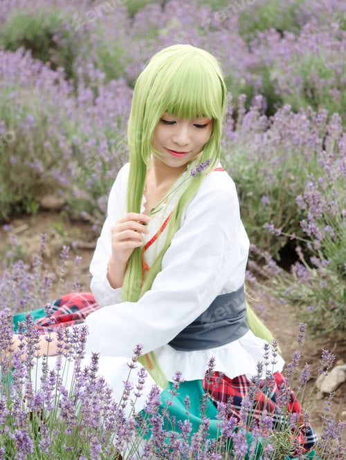Preview: Portrait Of Beautiful Cosplay Girl In Green Hair Holding Lavender Flower In Hand In Lavender Filed.