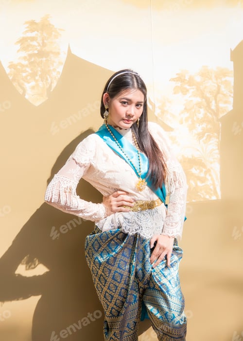 Preview: Asian Thai Girl Pround To Thai Vintage Costume Posting On Brown Thai Architecture Background