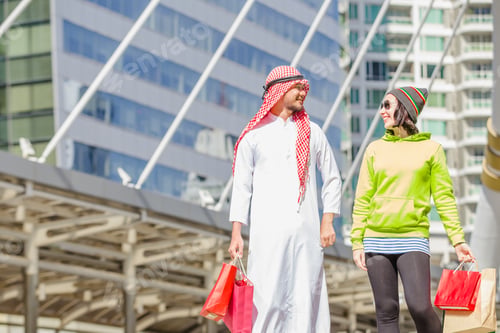 Preview: Happy Arabic Men With City Shopping Hand Holding Paper Bags